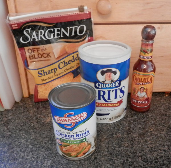 Best Cheese Grits - Grits, Chicken Broth, Cheddar Cheese, Chipotle Hot Sauce