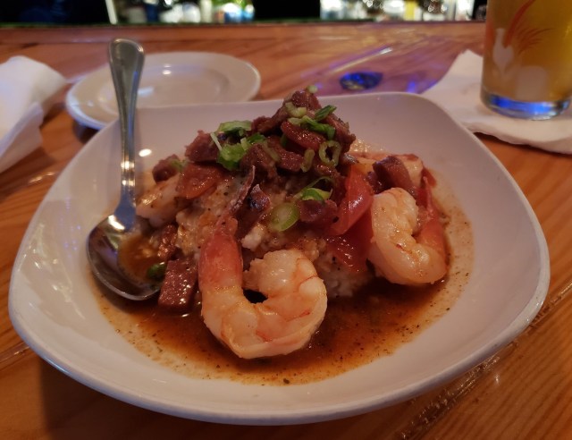 A plate of shrimp and grits
