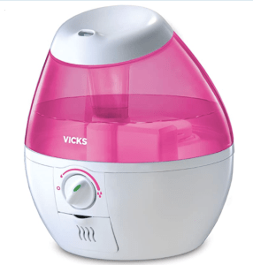 A small pink and white humidifier.