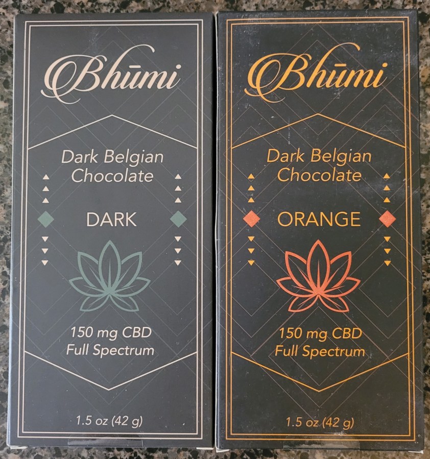 Two bars of Bhumi Belgian Chocolate with CBD.
