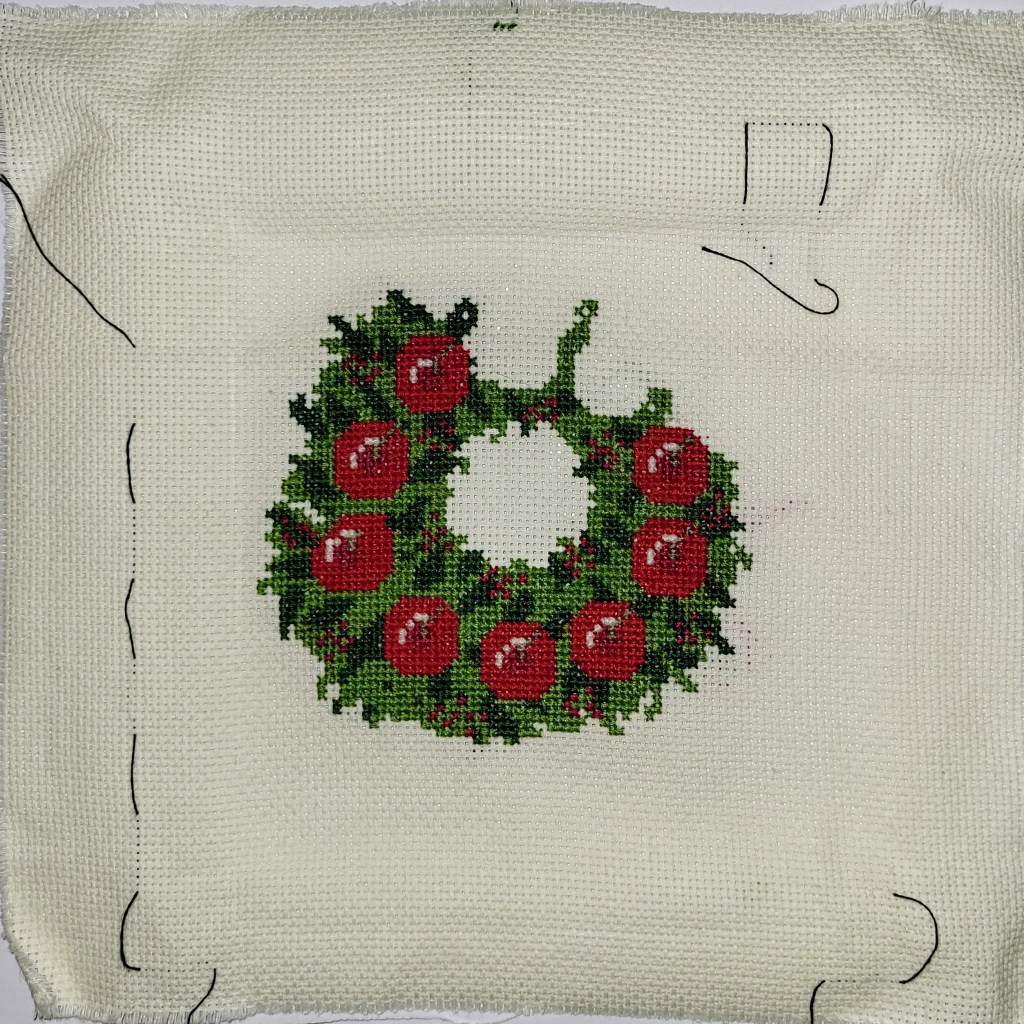 Christmas wreath cross stitch project, approximately 3/4 done!