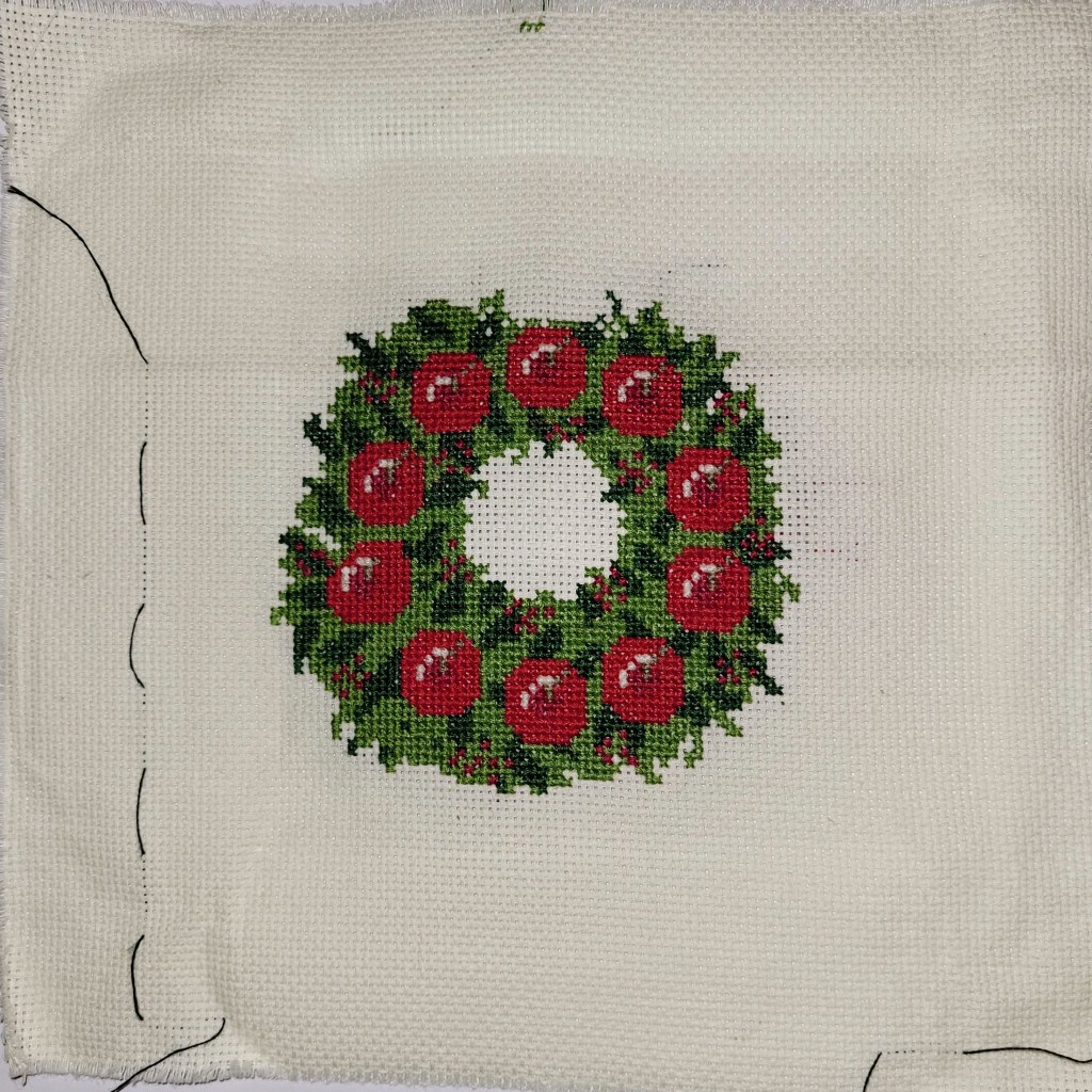 Work in Progress - Christmas Wreath cross stitch, roughly 95% done!