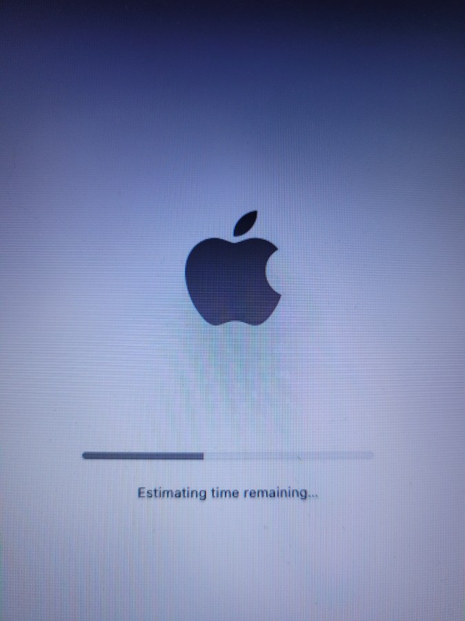 Apple logo and progress bar saying estimating time remaining