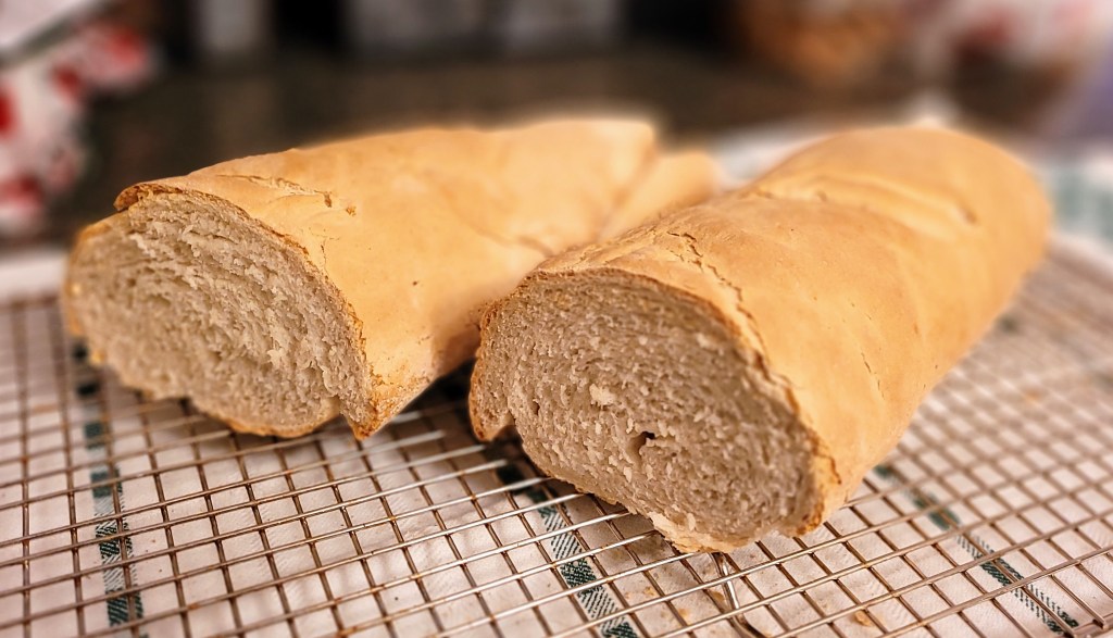 Homemade french bread, sliced in half.