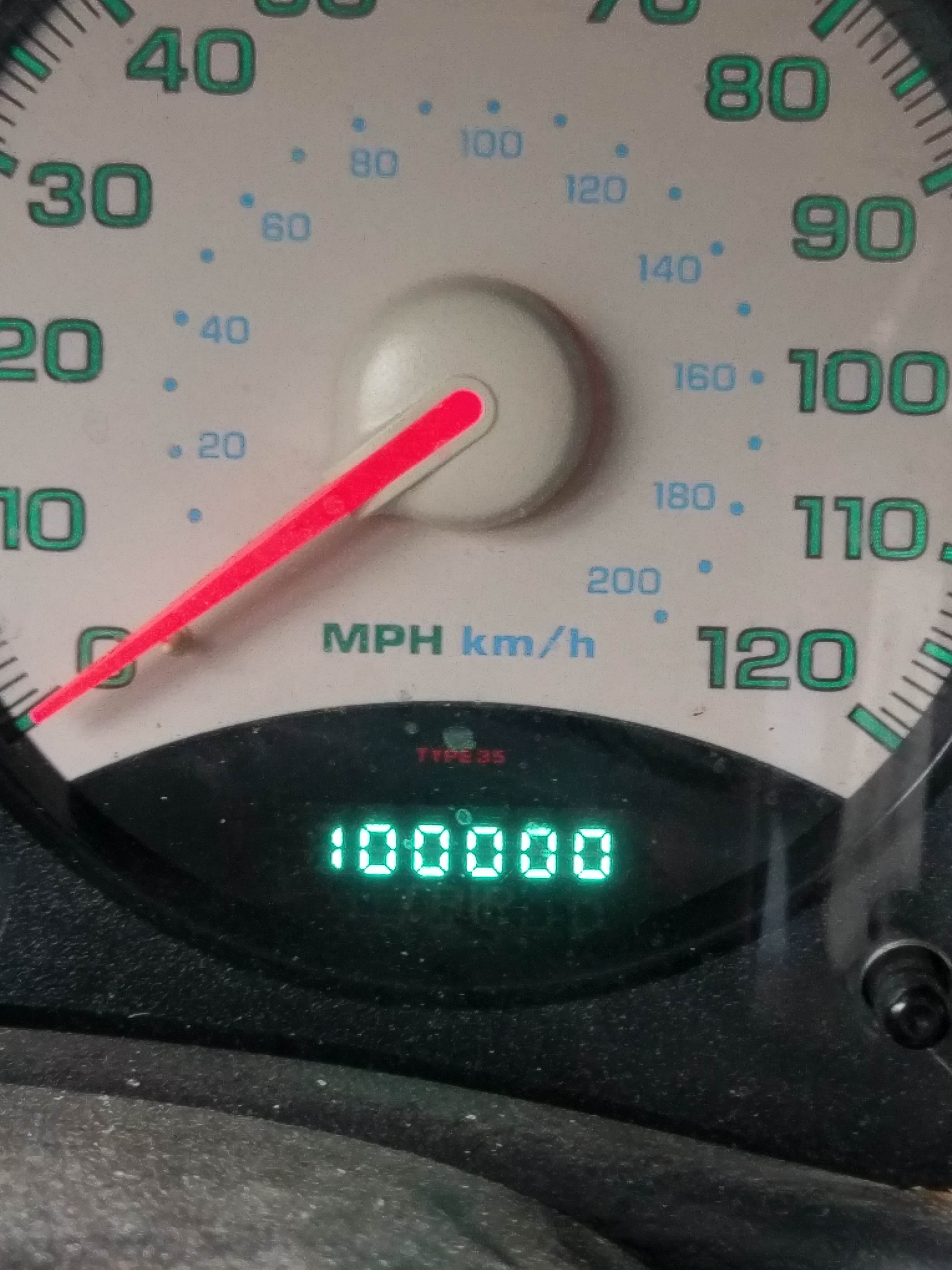 Shot of my odometer hitting 100,000 miles