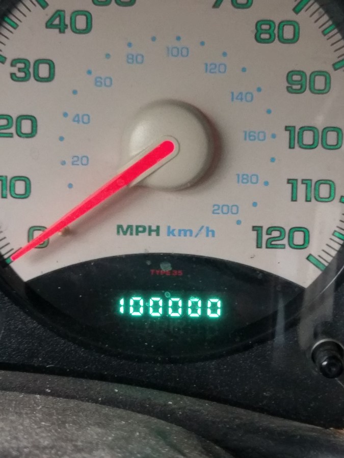 Shot of my odometer hitting 100,000 miles