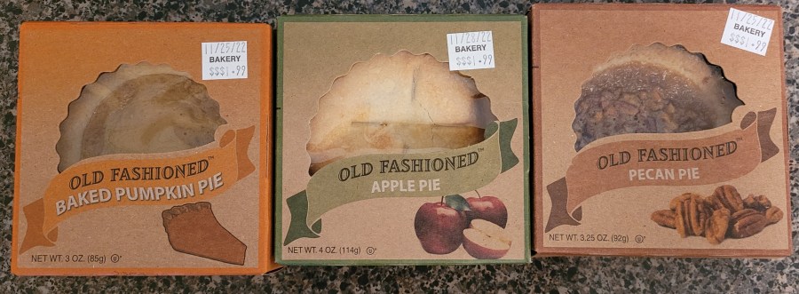 Three tiny pie boxes - pumpkin, apple, and pecan