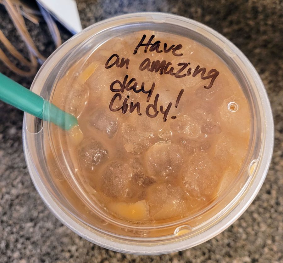 The top of my cup of cold brew with "Have an amazing day Cindy!" written on it